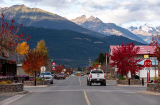 A truck drives through a main street in Valemount.